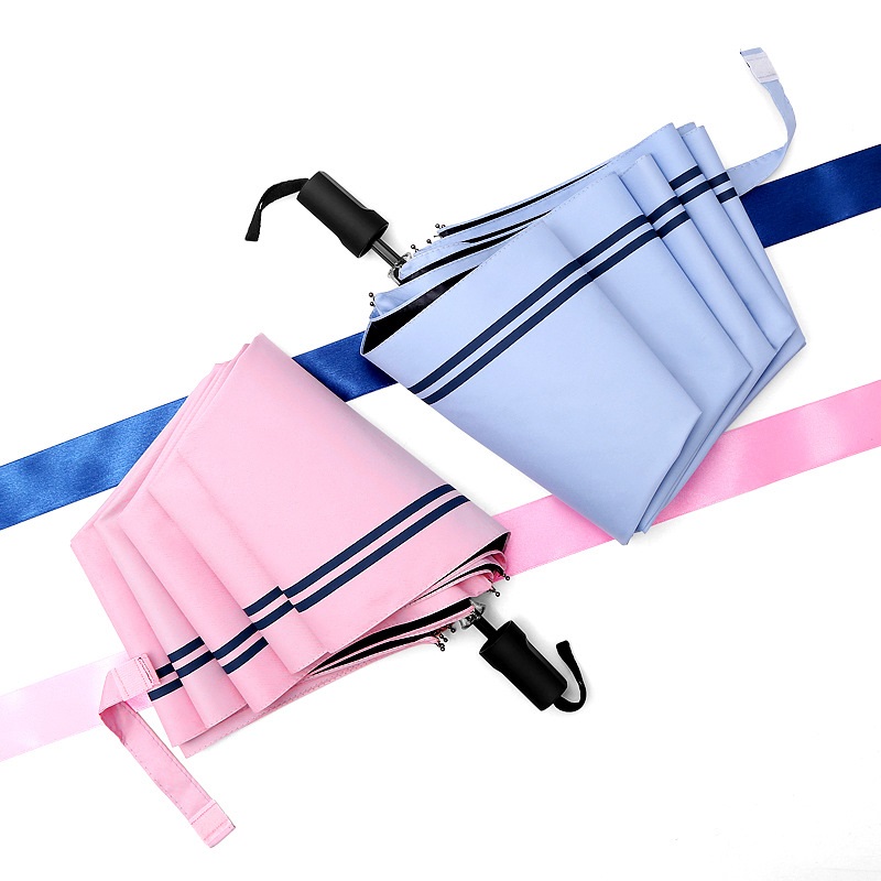 manual folding striped umbrella